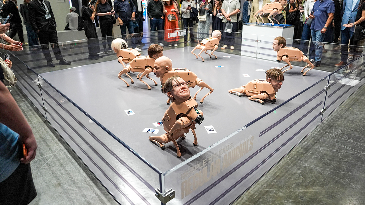 Billionaire heads on robot dogs pooping photos go viral at major Miami art fair
