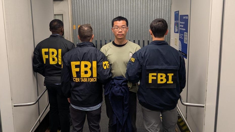 FBI brings alleged China-linked hacker to US in rare extradition as Patel defends Italy trip