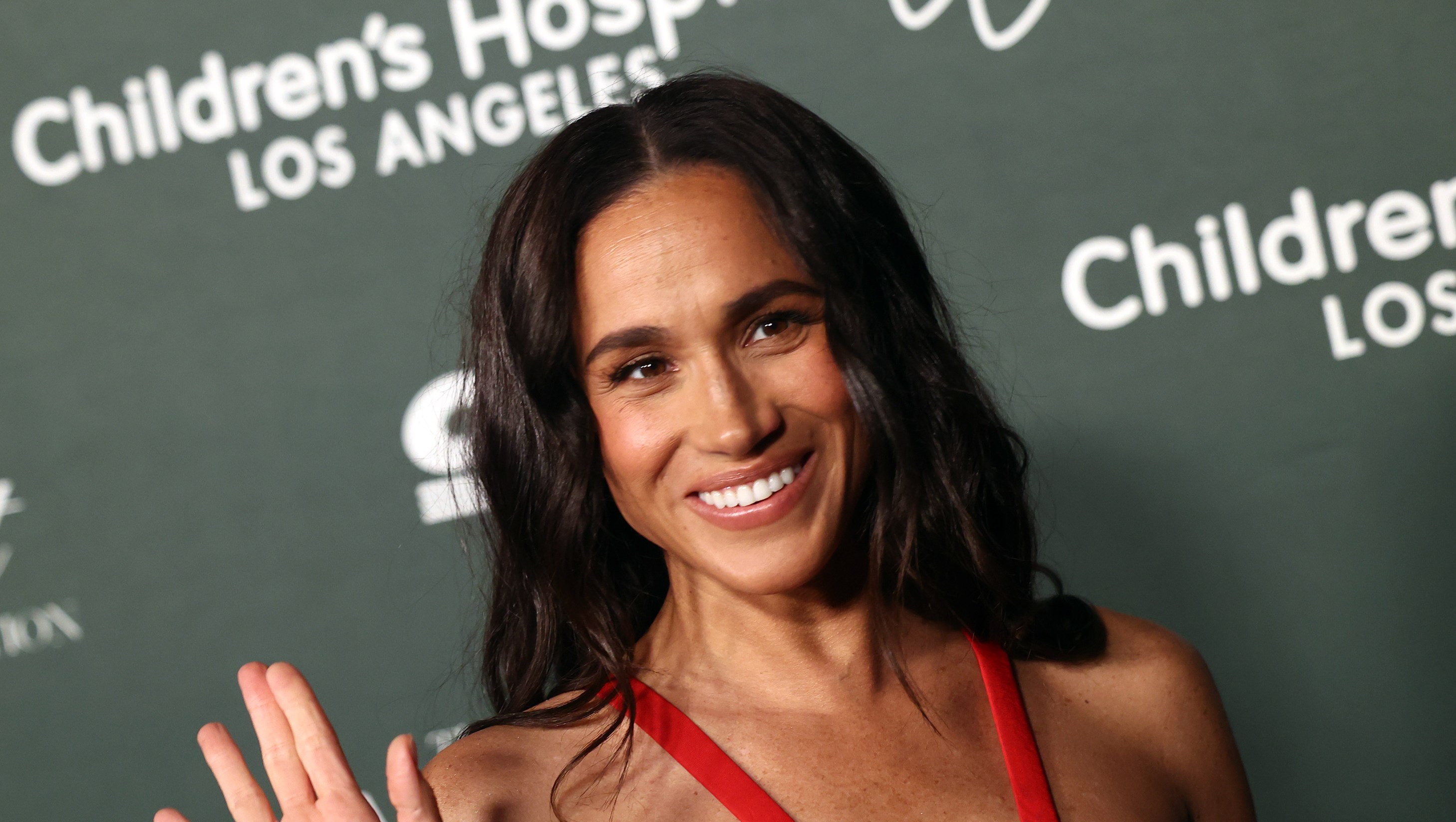 Meghan Markle’s Designer Clutch Costs Thousands — The Look for $35