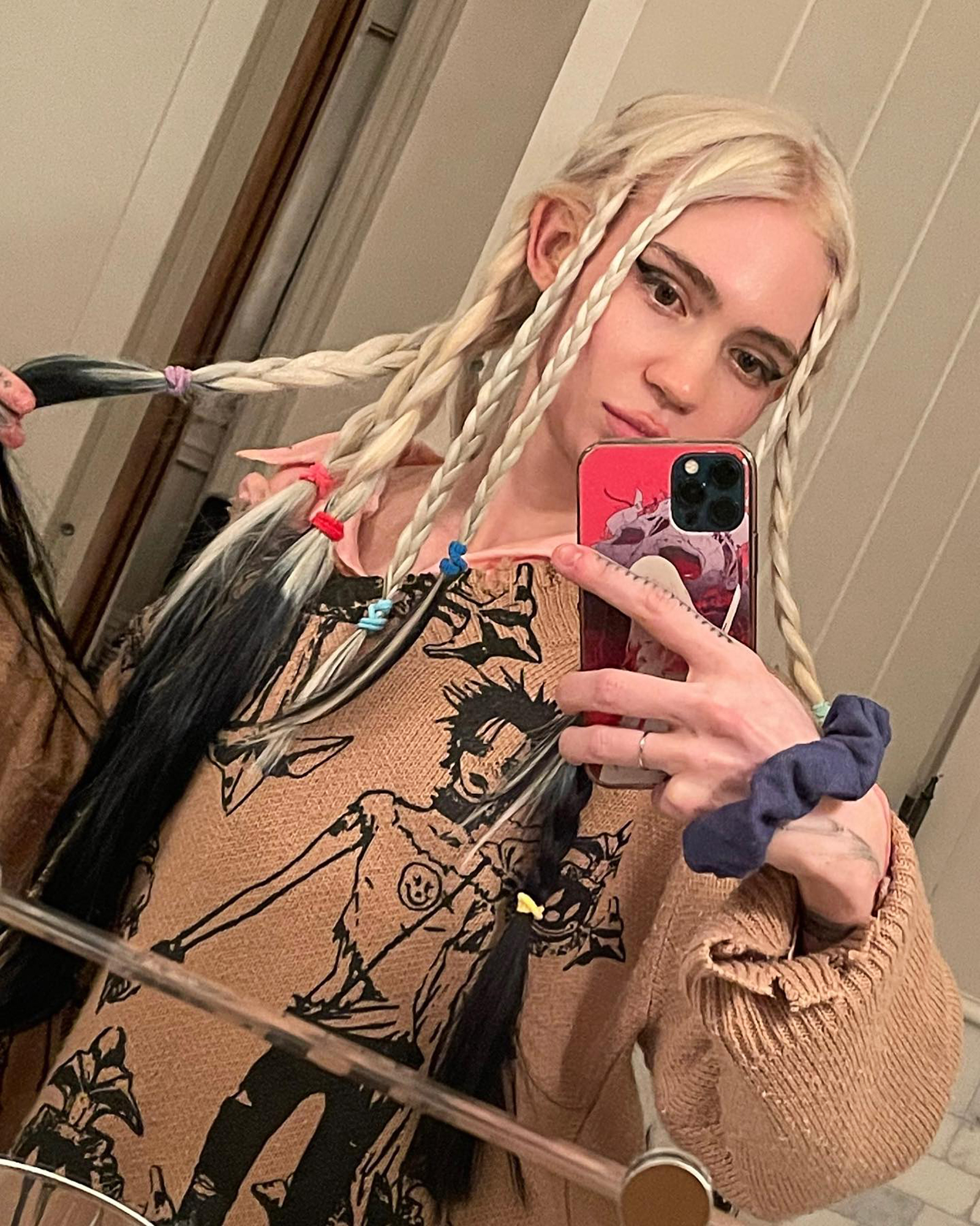 Everything Grimes Has Said About Raising Kids With Elon Musk