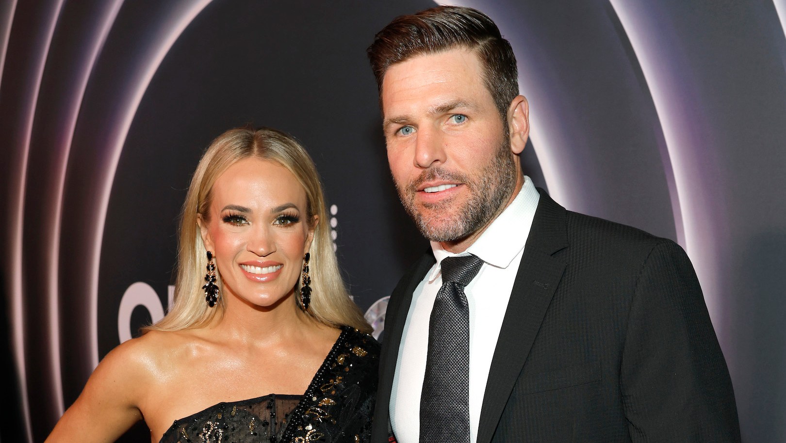 Carrie Underwood and Husband Mike Fisher Enjoy Rare Date at Hockey Game