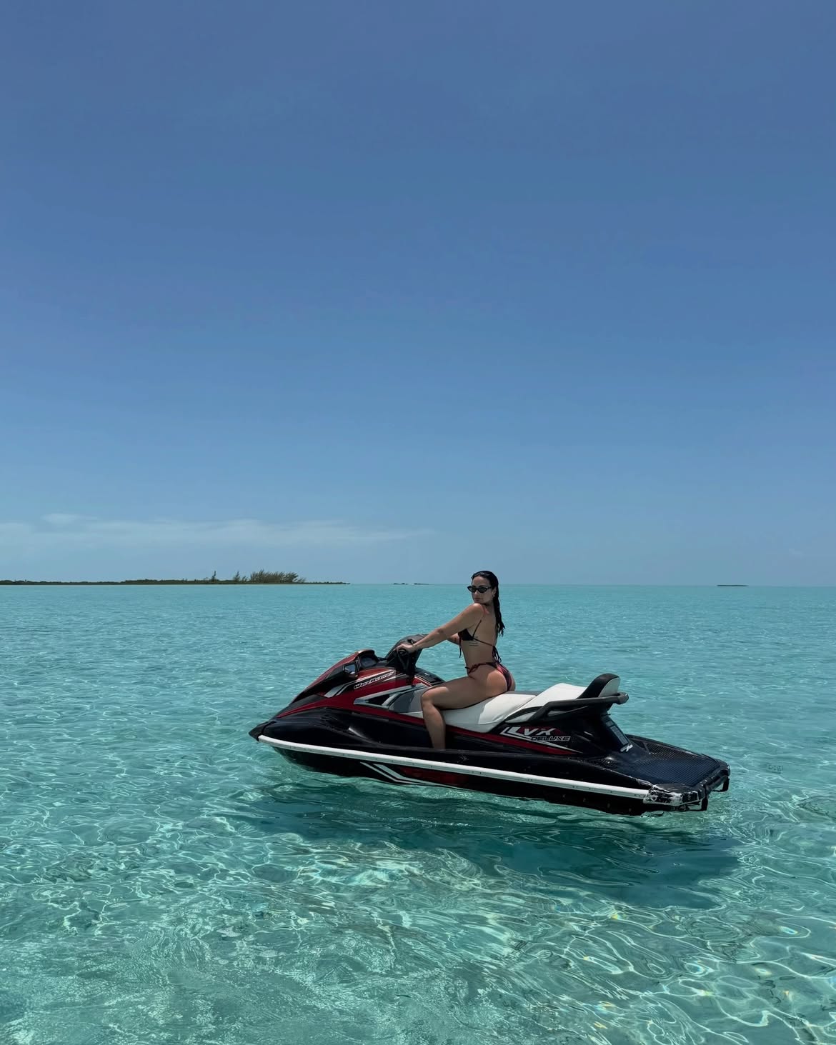 Demi Lovato Sizzles While Jet-Skiing in a Thong Bikini During Bahamas Trip