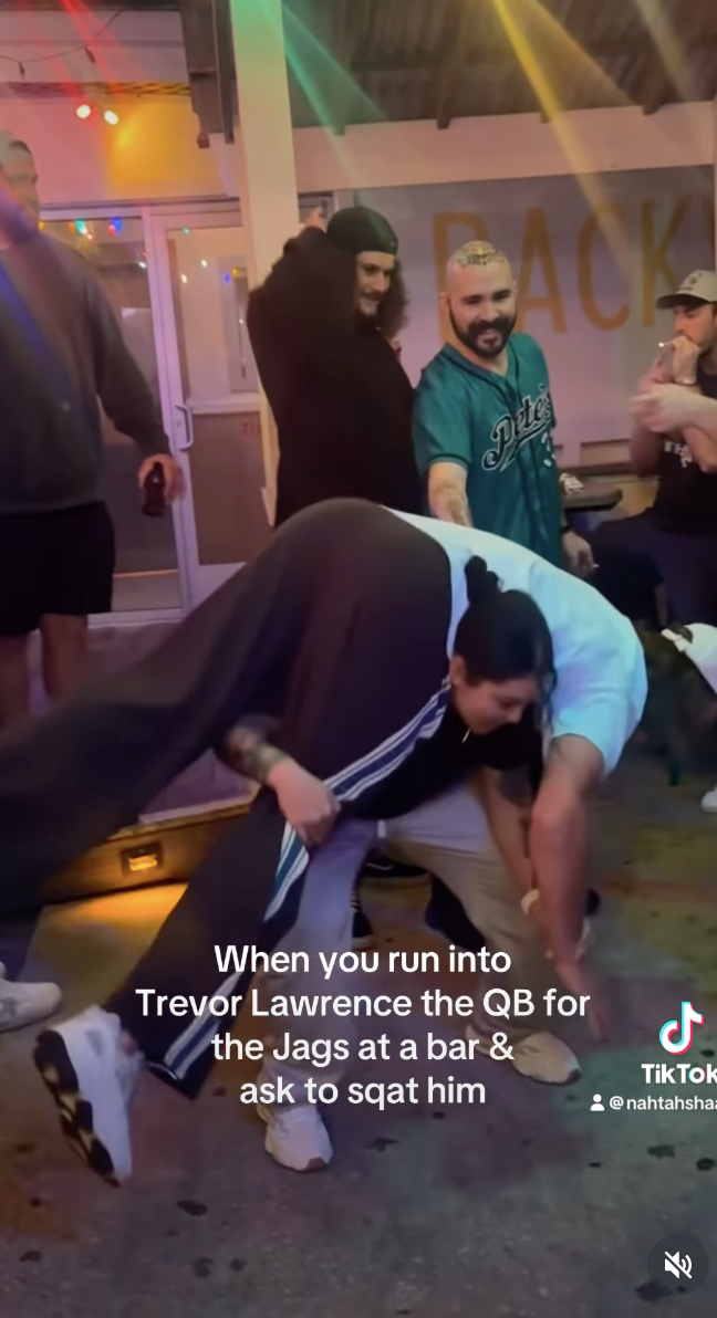 Jaguars Fan Sees Trevor Lawrence at Bar, Does Squats With Him on Her Back