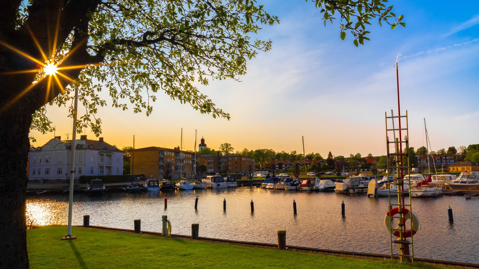 Situated Between Stockholm And Oslo Is Sweden's Lakeside Village Brimming With Art, Shops, And Cute Cafes
