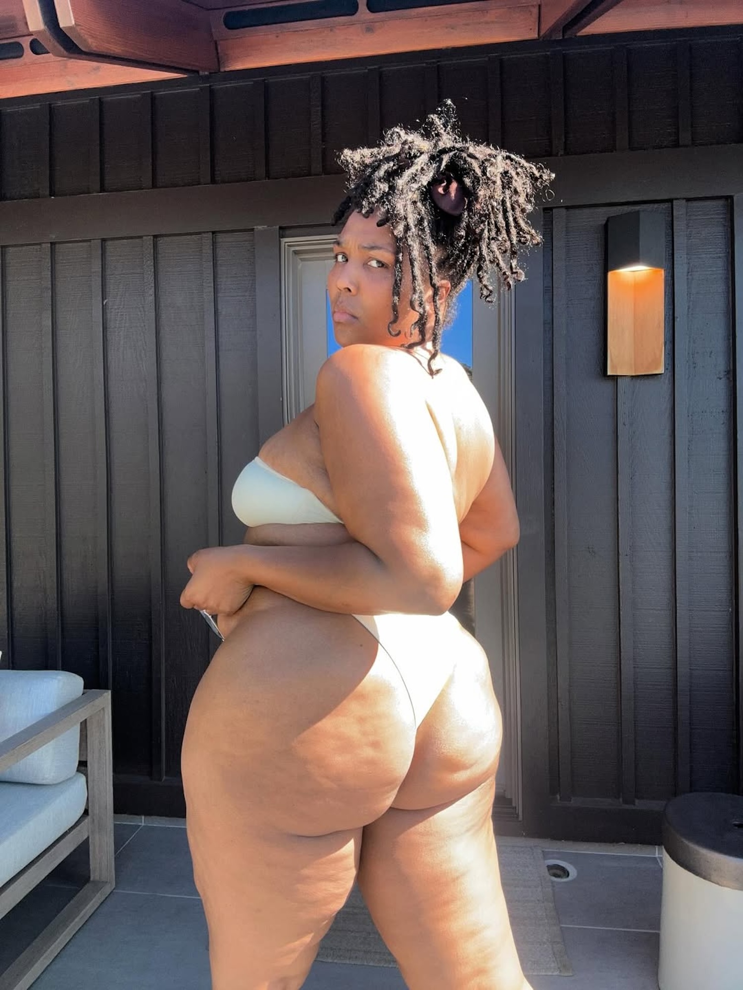 Lizzo Shares Her Wild New Year's Resolution in a Booty-Baring Bikini