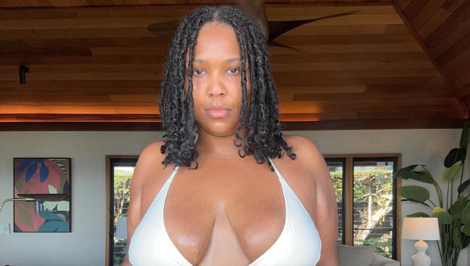 Lizzo Shares Tiny White Bikini Thirst Trap Amid Weight Loss