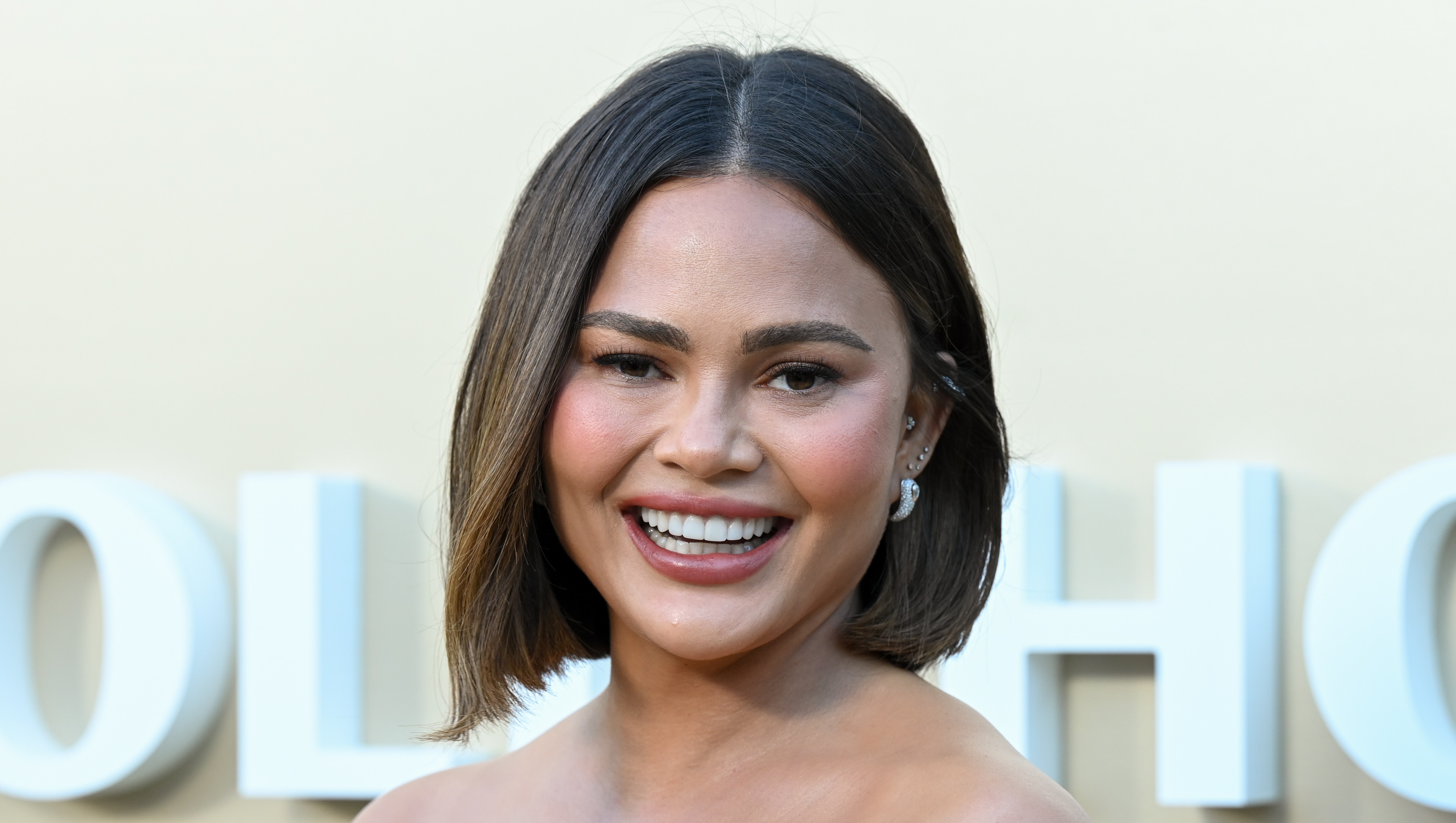 We Found Chrissy Teigen's Designer Floral Blouse Style for $15