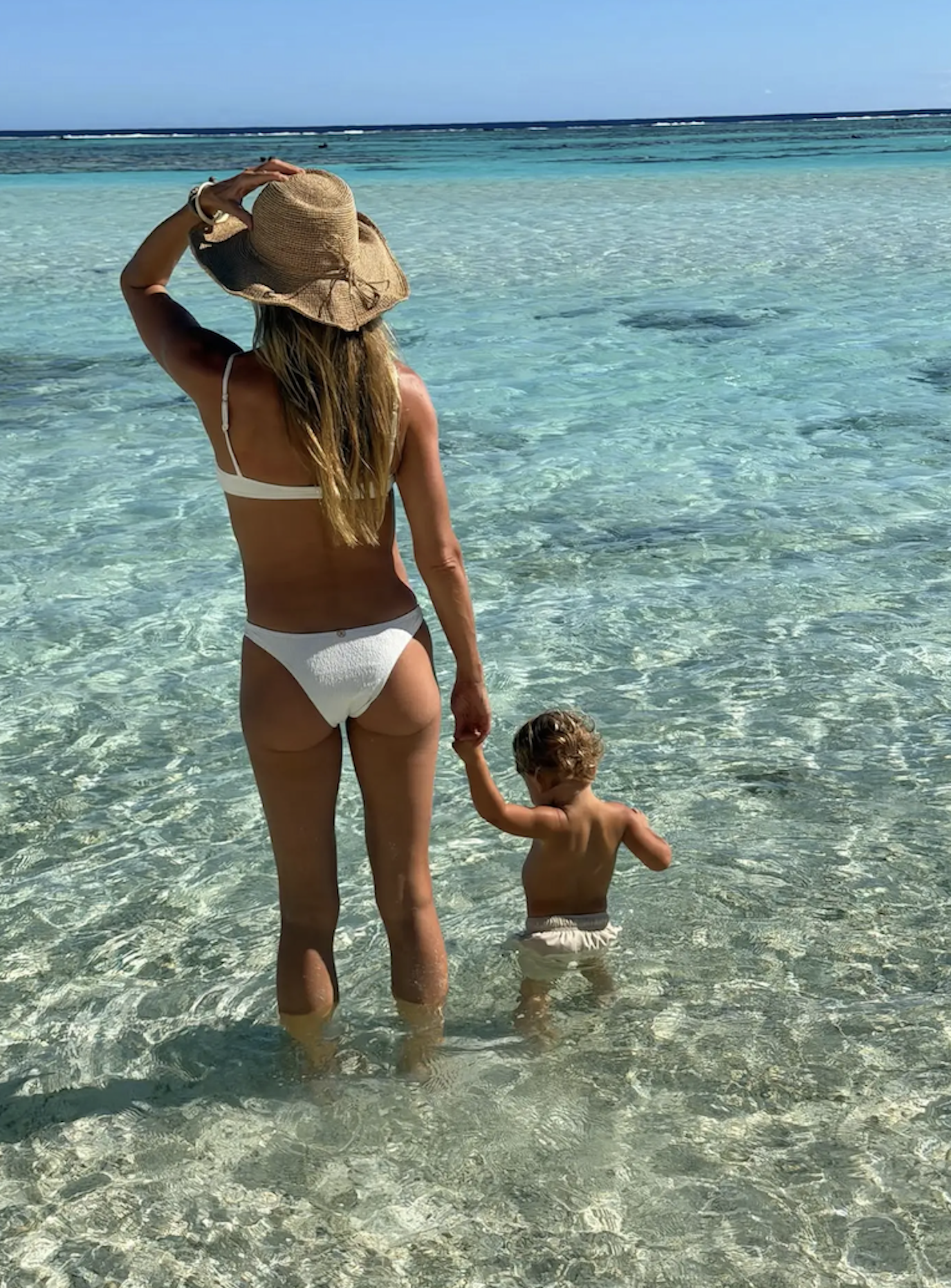 Gisele Bundchen Rocks White Bikini In Rare Pic With Son and Husband Joaquim