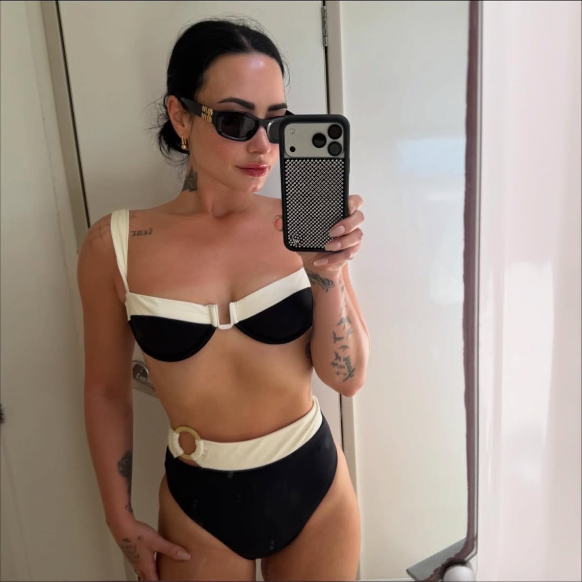 Demi Lovato Is ‘Warm For the Winter’ in a Black-and-White Bikini