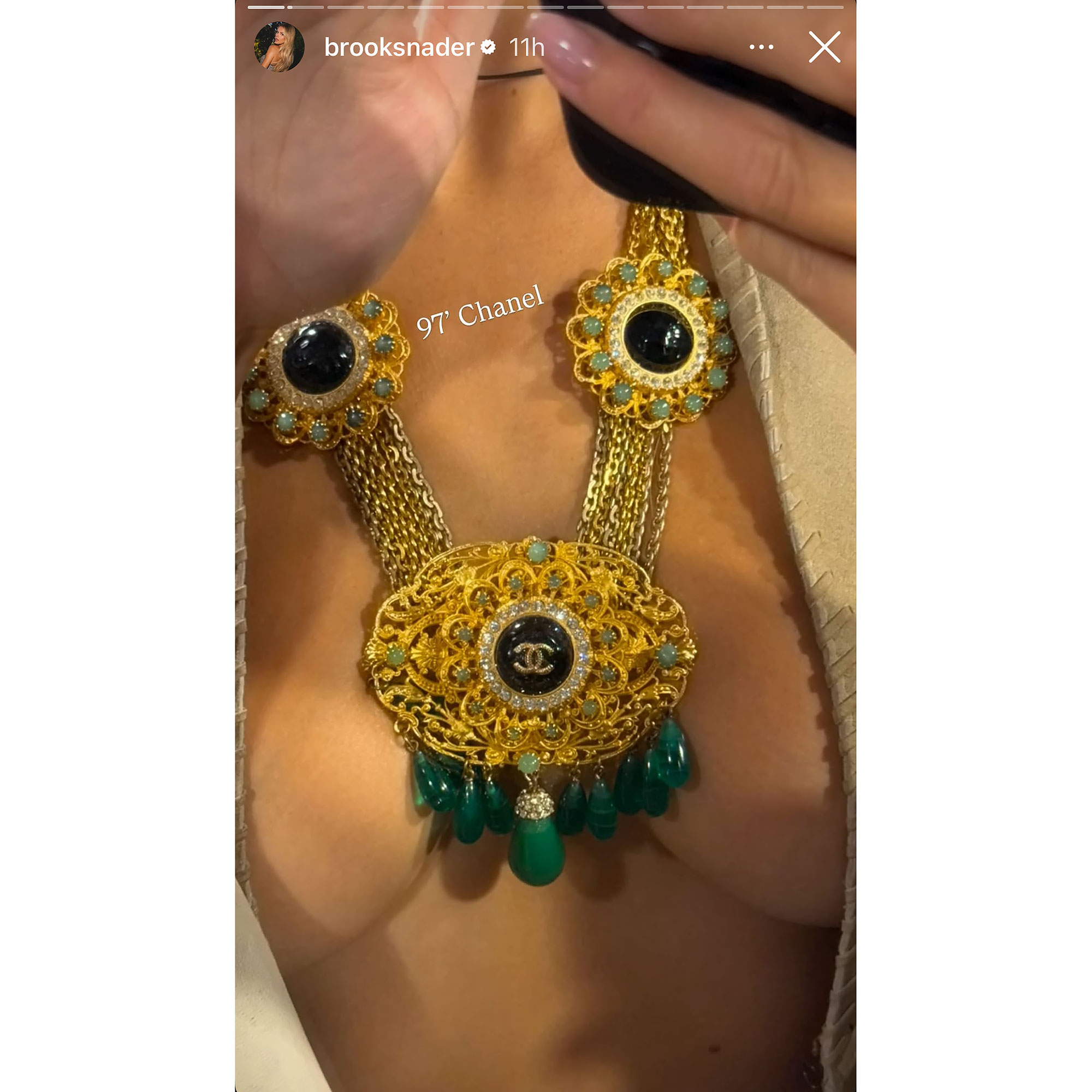 Brooks Nader Nearly Has a Nip Slip While Wearing a Vintage Chanel Necklace