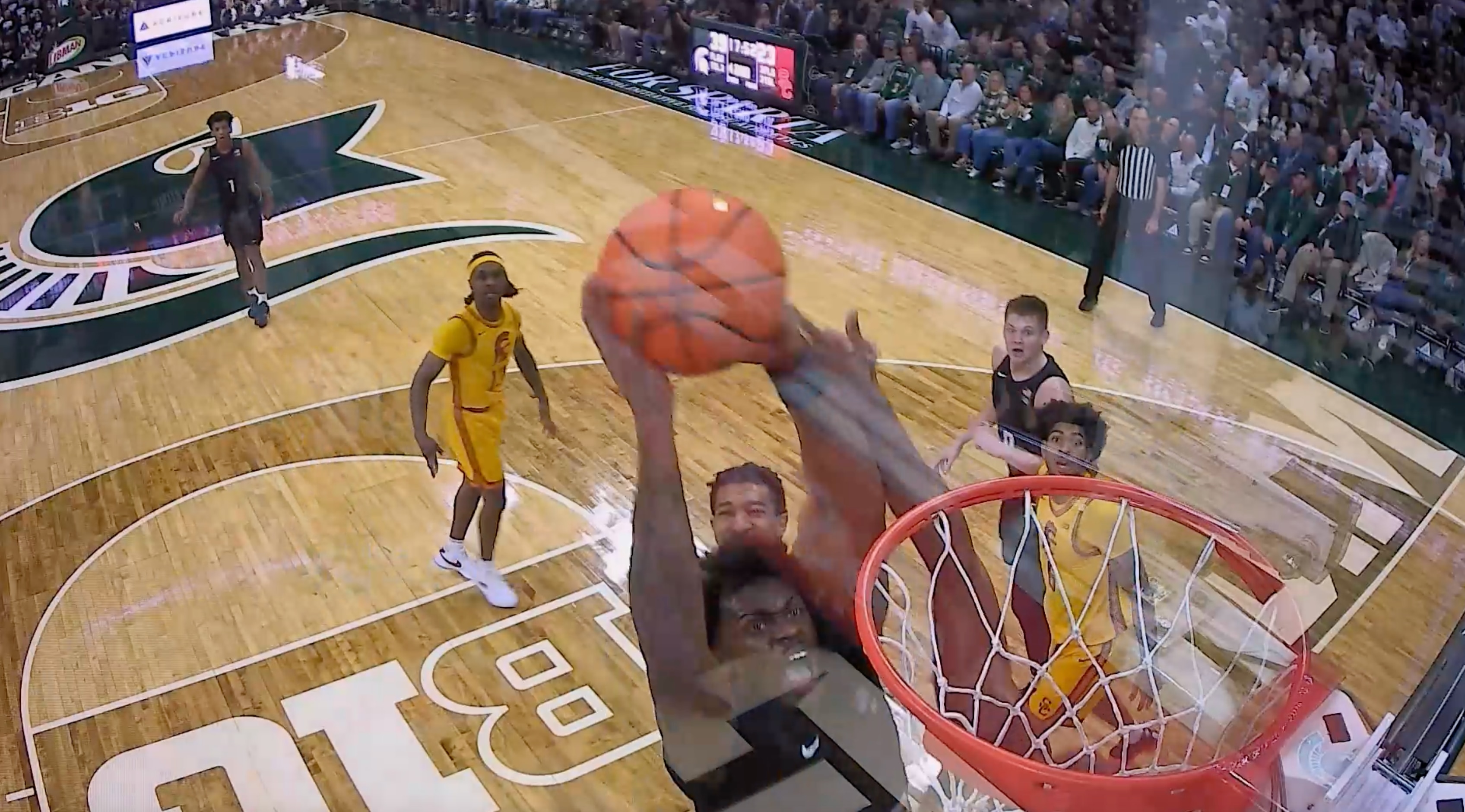 Michigan States' Coen Carr Posterizes Defender with Slam Dunk vs. USC