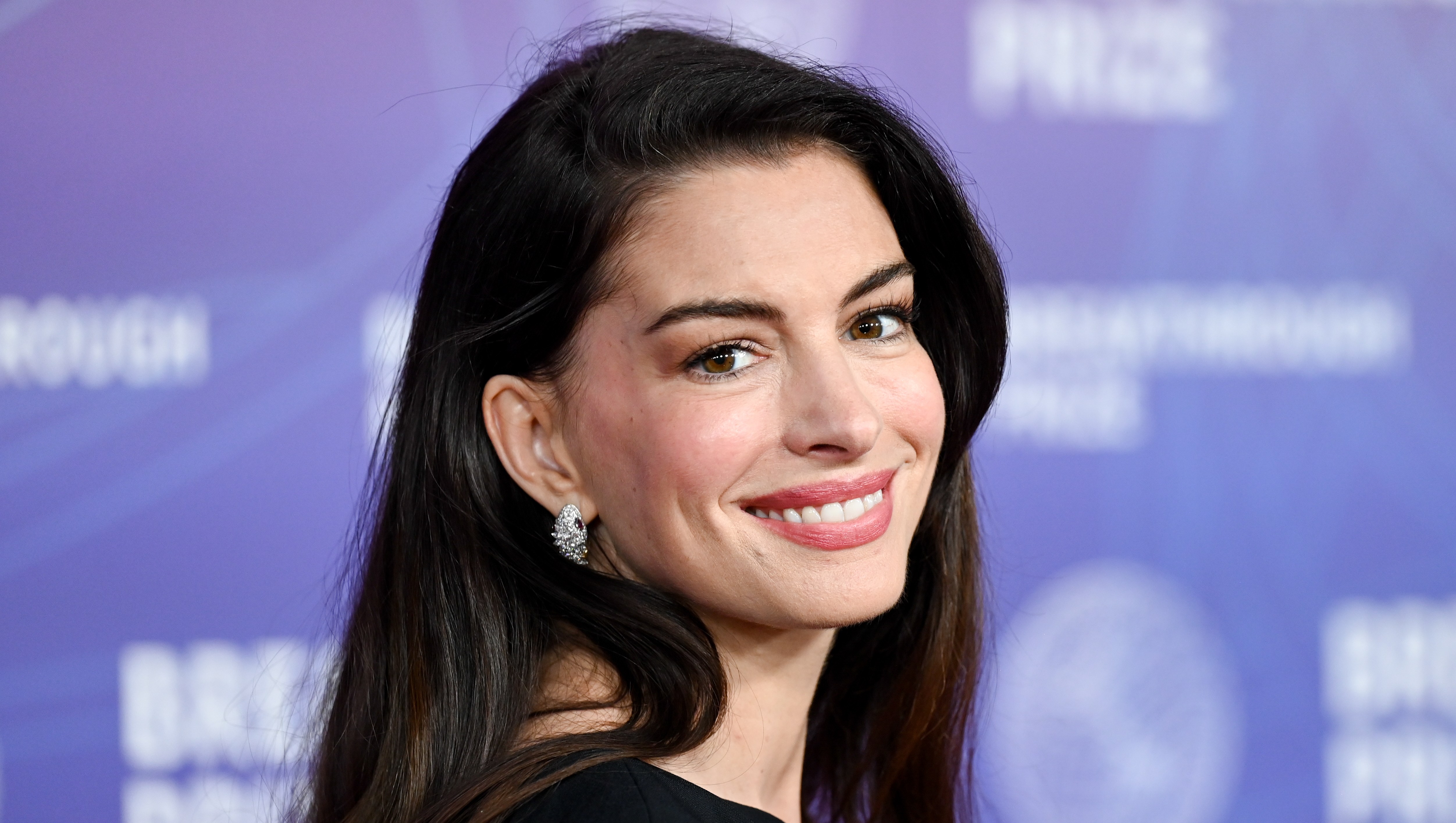 Anne Hathaway's Unusual Adidas Sneakers Are the Upgrade We Didn't Know We Needed